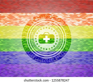medical briefcase icon inside emblem on mosaic background with the colors of the LGBT flag