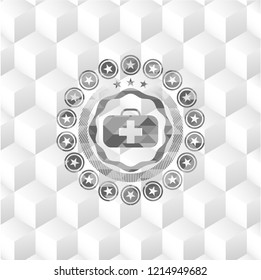 medical briefcase icon inside grey icon or emblem with geometric cube white background