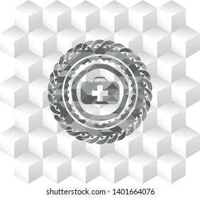 medical briefcase icon inside grey icon or emblem with geometric cube white background