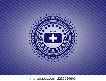 medical briefcase icon inside jean or denim emblem or badge background. 
