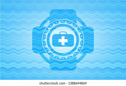 medical briefcase icon inside light blue water wave emblem.