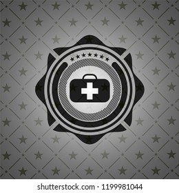 medical briefcase icon inside realistic dark emblem