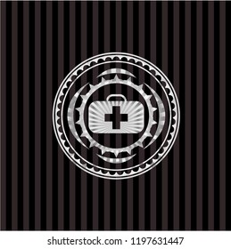 medical briefcase icon inside silver emblem