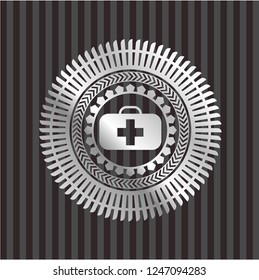 medical briefcase icon inside silver shiny badge