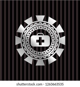 medical briefcase icon inside silver emblem