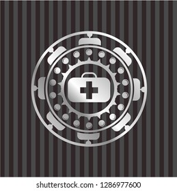 medical briefcase icon inside silver badge