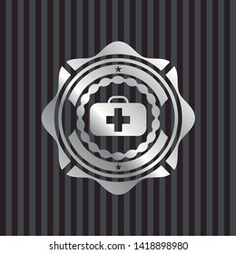 medical briefcase icon inside silver shiny badge