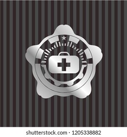medical briefcase icon inside silvery badge