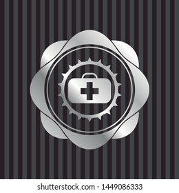 medical briefcase icon inside silvery emblem