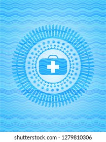 medical briefcase icon inside sky blue water style badge.
