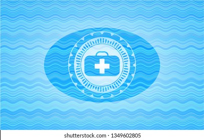 medical briefcase icon inside sky blue water wave emblem.