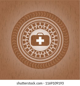medical briefcase icon inside vintage wooden emblem