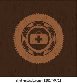 medical briefcase icon inside vintage wood emblem