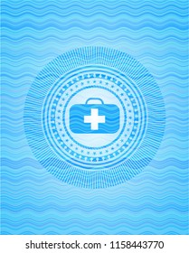 medical briefcase icon inside water wave concept style emblem.