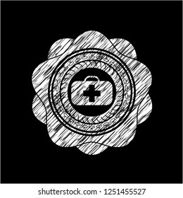 medical briefcase icon on chalkboard
