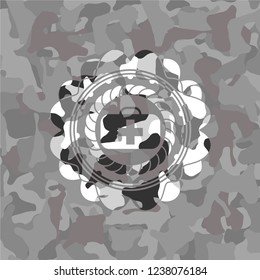 medical briefcase icon on grey camo pattern