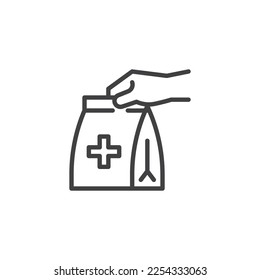 Medical delivery service line icon. linear style sign for mobile concept and web design. Hand with paper bag with medicine outline vector icon. Symbol, logo illustration. Vector graphics