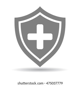 Medical health concept. Isolated grey shiel with cross on white background. First aid and healthcare.