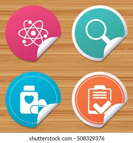 Medical icons. Atom, magnifier glass, checklist.