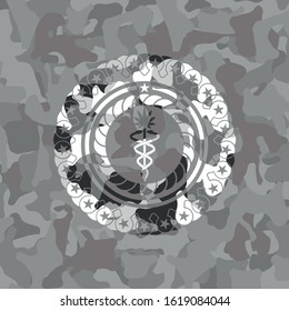 medical marijuana icon inside grey camouflage emblem