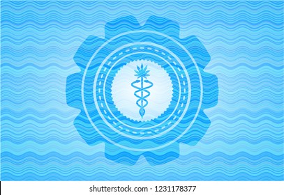 medical marijuana icon inside light blue water wave style emblem.