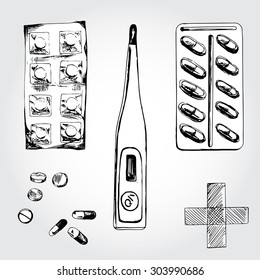 Medical set with different capsules and thermometer