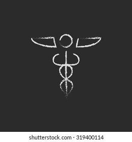 Medical symbol hand drawn in chalk on a blackboard vector white icon isolated on a black background.