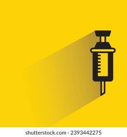 medical syringe icon with shadow on yellow background