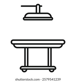 Medical table with lamp hanging above, representing healthcare and surgery