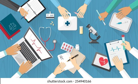 Medical team desktop with doctors and medical equipment