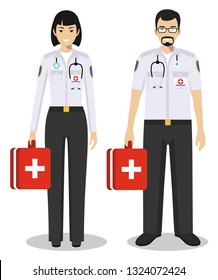 Medical teamwork concept. Detailed illustration сouple of paramedic man and woman, emergency doctor, nurse in flat style on white background. Practitioner doctors standing together. Vector