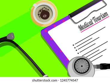 Medical tourism text on paper clip board, cup of coffee and stethoscope. Schedule or reminder planning with healthcare concept

