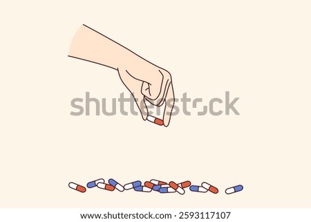 Medicinal capsules in hand of man experiencing problems with addiction to volitional drugs or antidepressants. Medicinal capsules to combat serious illness or symptoms of dangerous virus