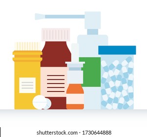 Medicinal kit for the treatment of throat, nose and cold. Plastic jars with pills, nasal spray and inhalation spray.