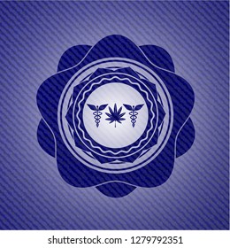 medicinal weed icon inside badge with denim texture