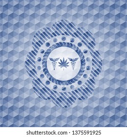 medicinal weed icon inside blue emblem or badge with abstract geometric pattern background.