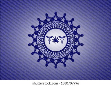 medicinal weed icon inside emblem with denim high quality background