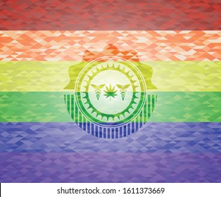 medicinal weed icon inside emblem on mosaic background with the colors of the LGBT flag