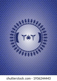medicinal weed icon inside emblem with jean texture. 