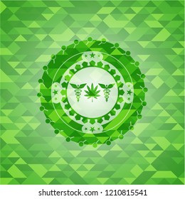 medicinal weed icon inside green mosaic emblem