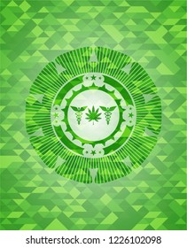 medicinal weed icon inside green emblem with mosaic ecological style background