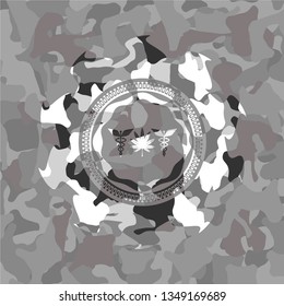 medicinal weed icon inside grey camouflage emblem