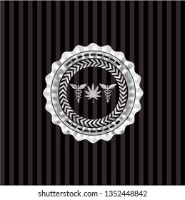 medicinal weed icon inside silver emblem