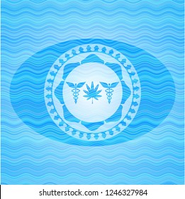 medicinal weed icon inside sky blue water style badge.