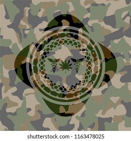 medicinal weed icon on camouflage texture