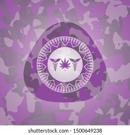 medicinal weed icon on pink camouflaged pattern