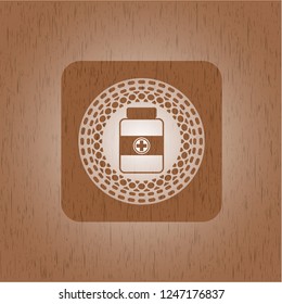 medicine bottle icon inside badge with wooden background