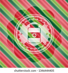 medicine bottle icon inside christmas colors style emblem.