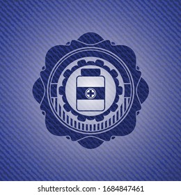 medicine bottle icon inside emblem with denim texture