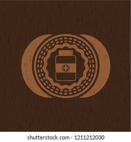 medicine bottle icon inside realistic wooden emblem